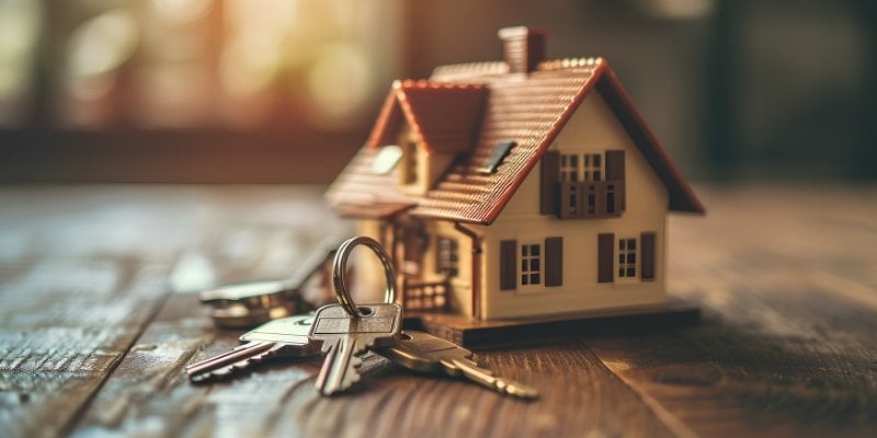 keys in front of a house